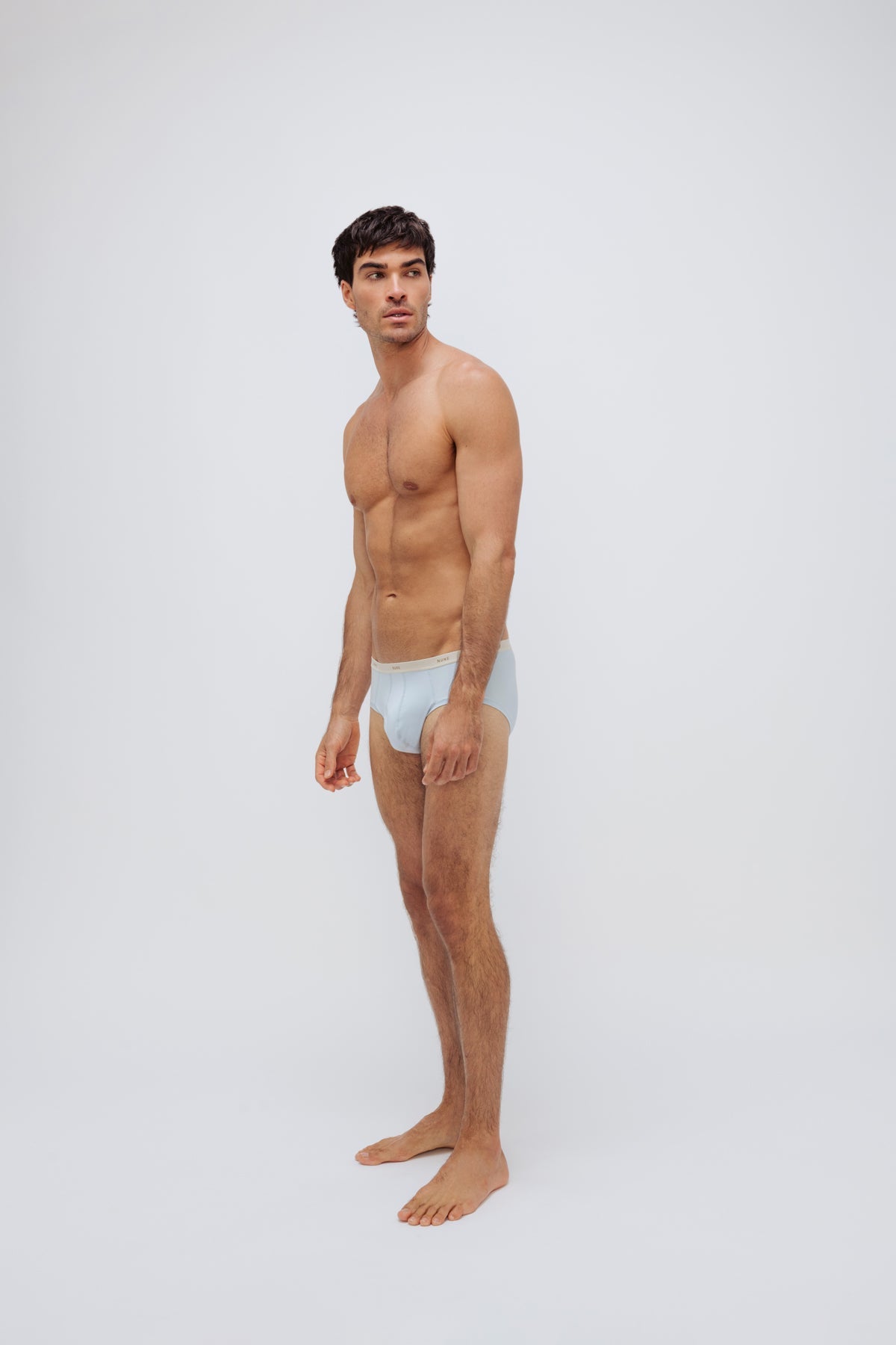 Daybreak men's original briefs worn by male model looking to side
