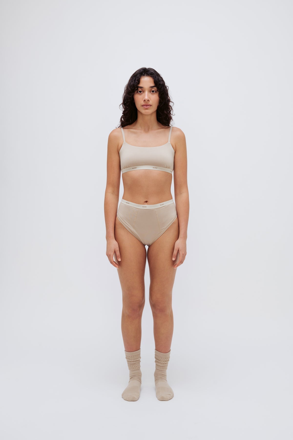 Square Neck Bralette in latte silky-soft micromodal blend worn with women's latte high waisted briefs by female model, front view