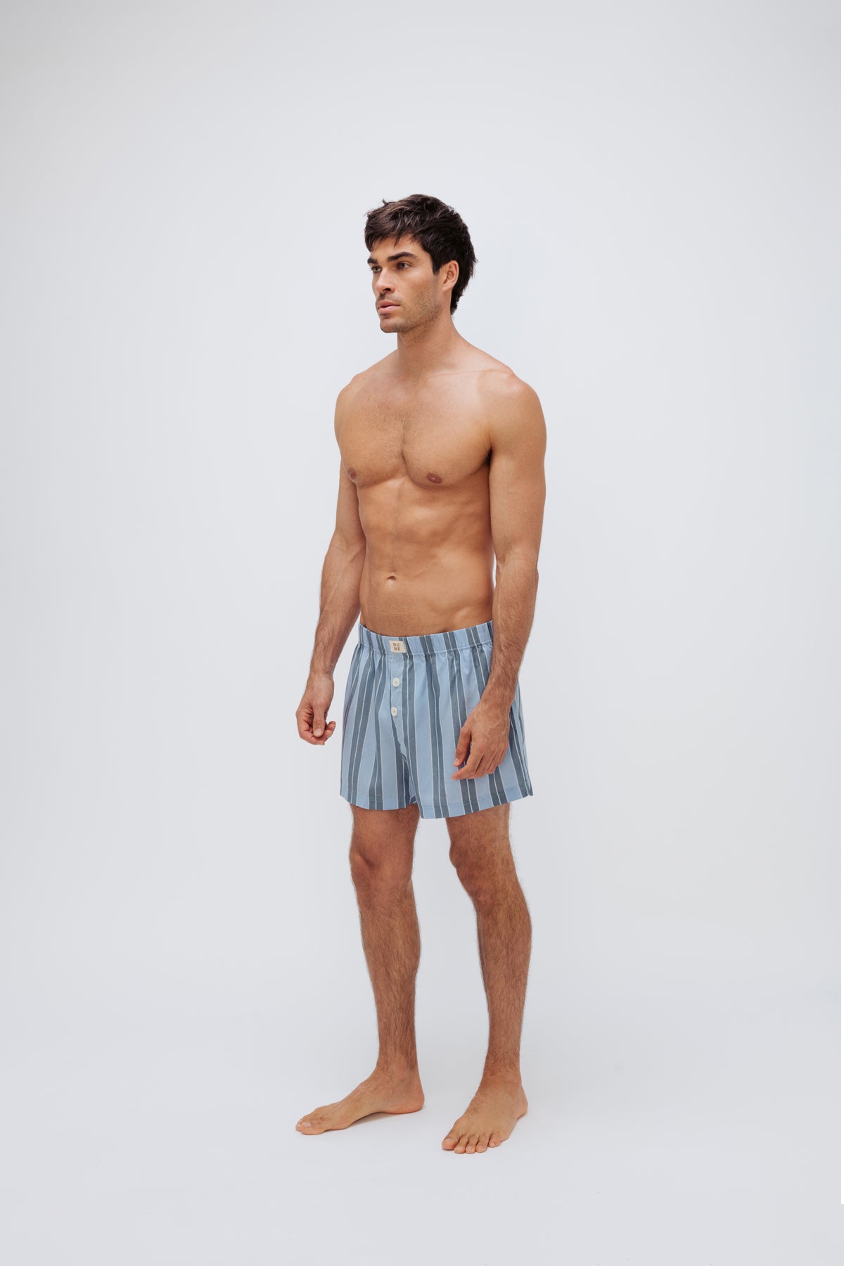 Boxer Short in Daybreak Stripe worn by male model full length side view