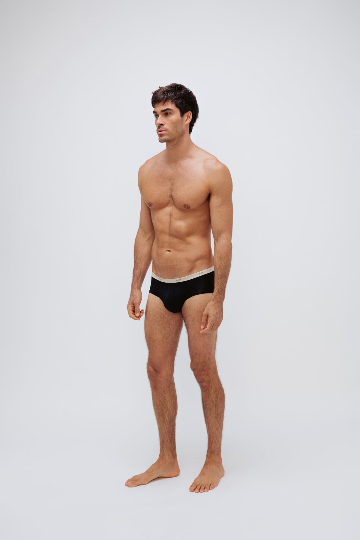 Men's Black Original Briefs crafted from premium micro modal worn by male model front side view