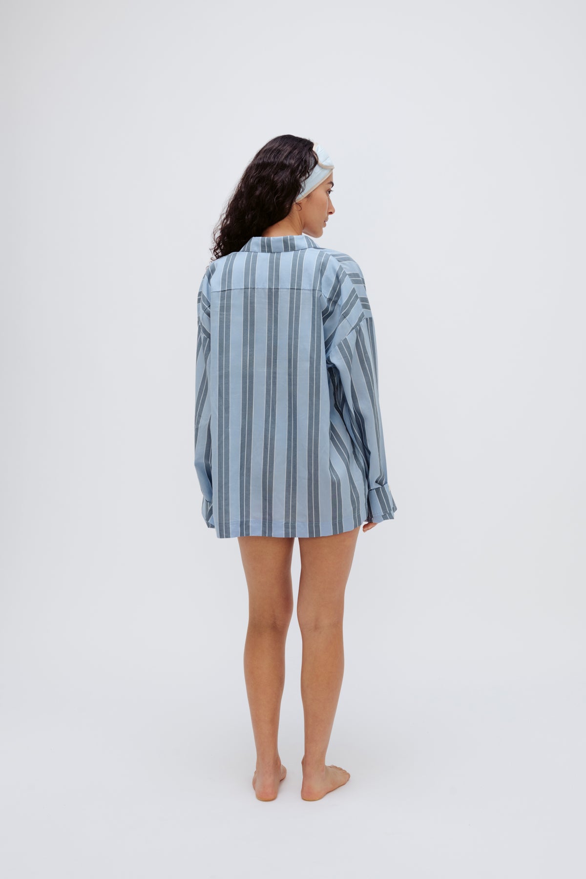 Blue Daybreak Stripe Long Sleeve Sleep Shirt in Macel worn by model with blue micromodal blend headband, back view of model