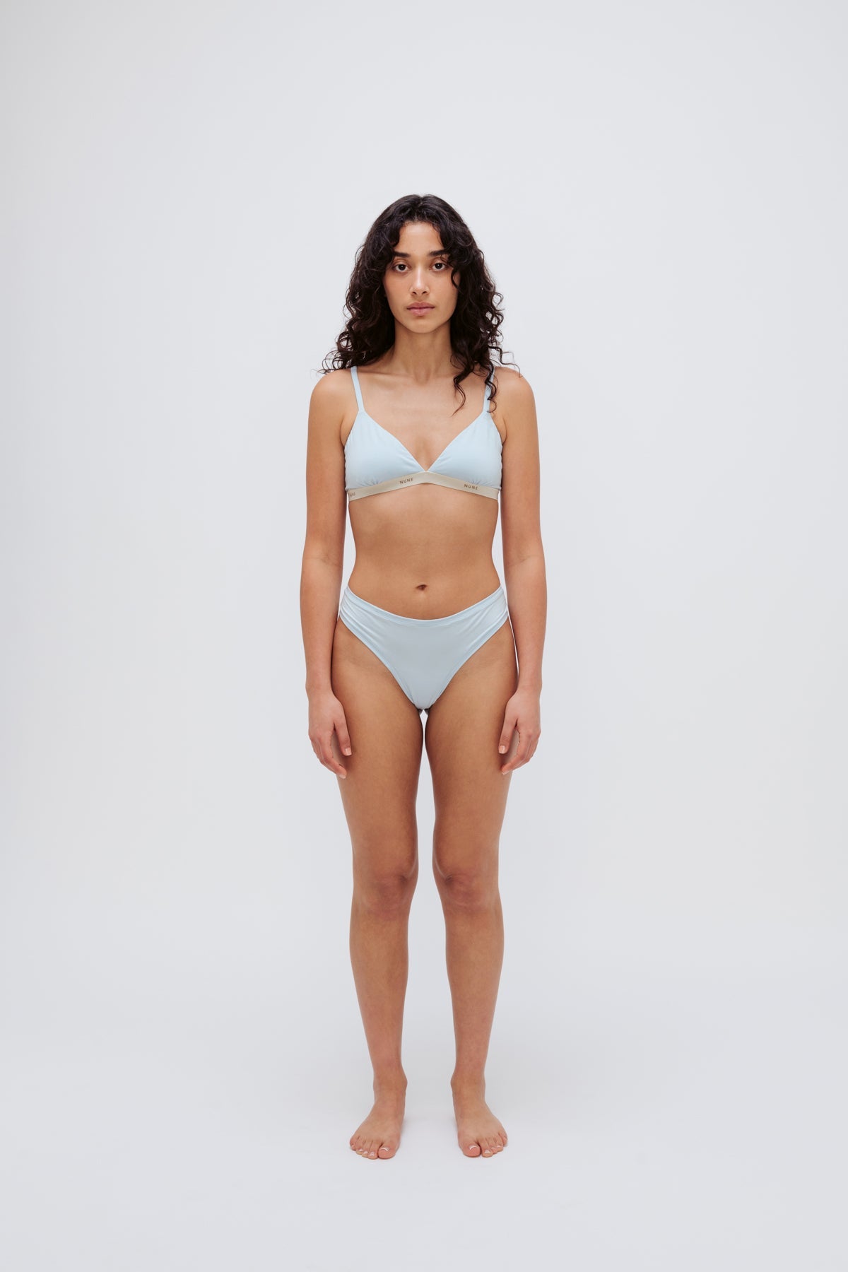 Triangle Bralette in daybreak silky-soft micromodal blend worn with women's daybreak g string by female model, front view