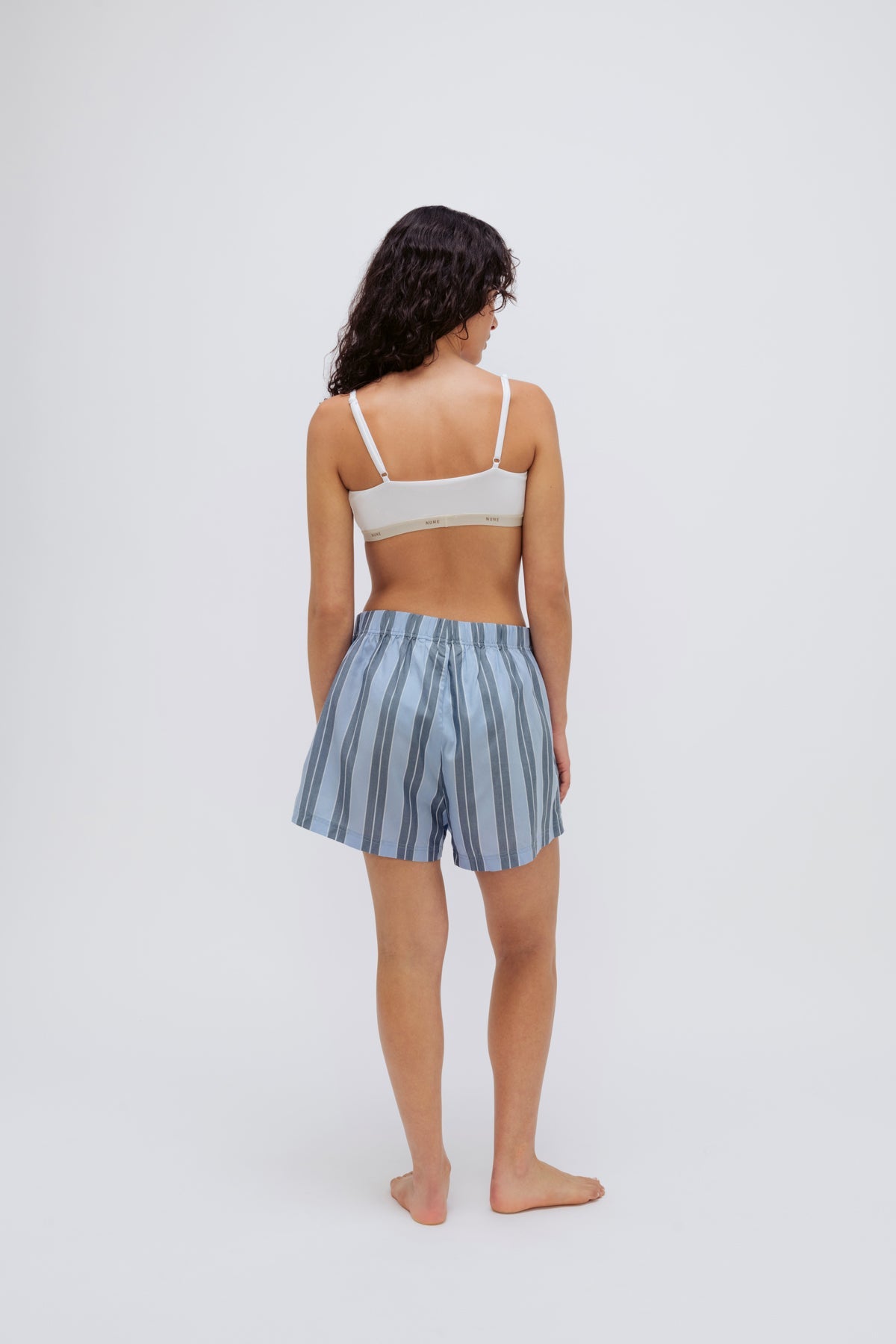 Boxer Short in Daybreak Stripe and Square Neck Bralette in White worn by female model full length back view