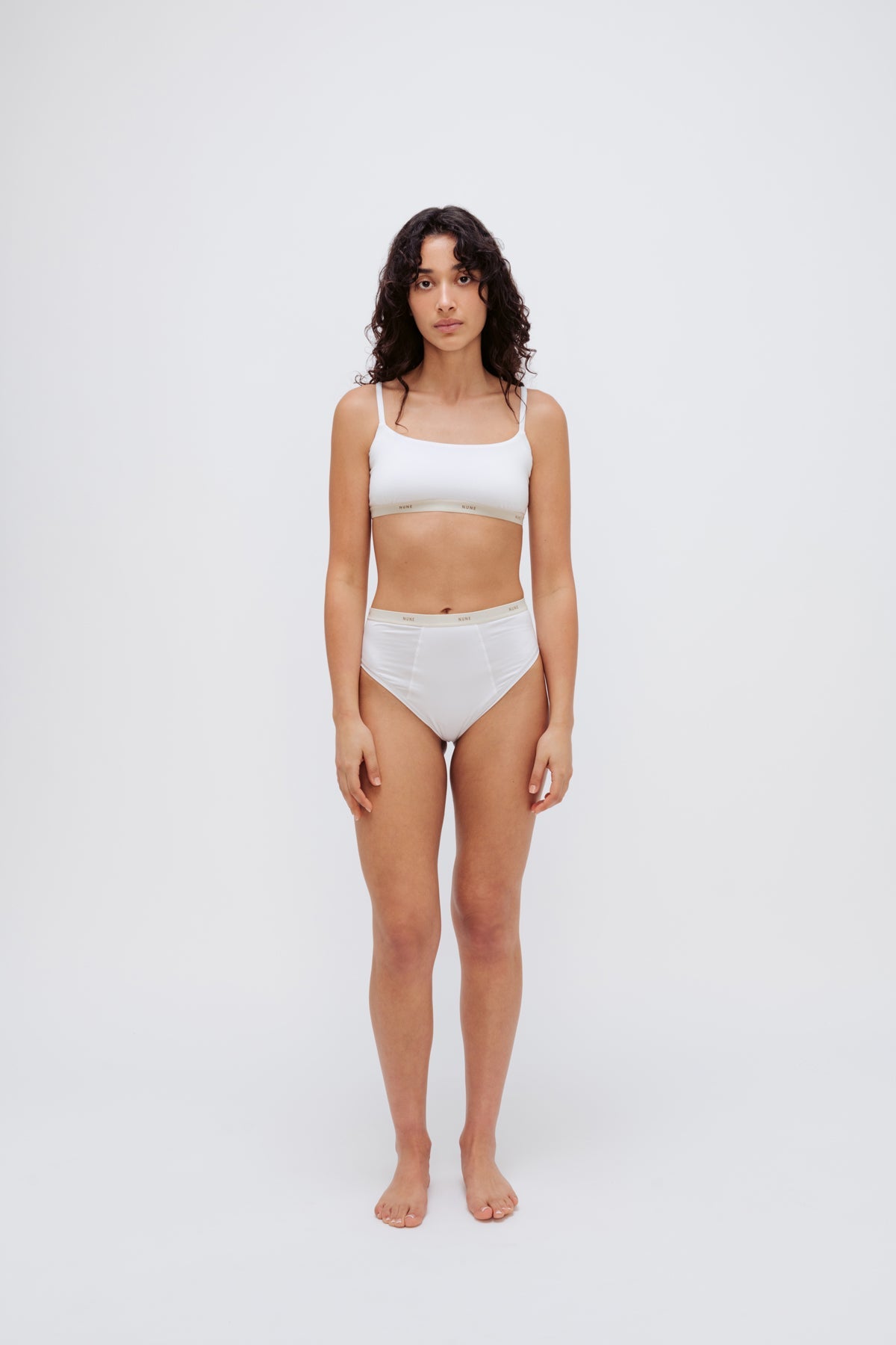 Square Neck Bralette in white silky-soft micromodal blend worn with women's white high waisted briefs by female model, front view