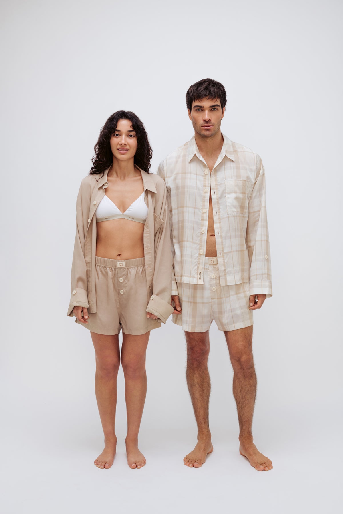Oat boxer shorts and sleep shirt worn by female model and oat check boxer shorts and sleep shirt worn by male model both facing front