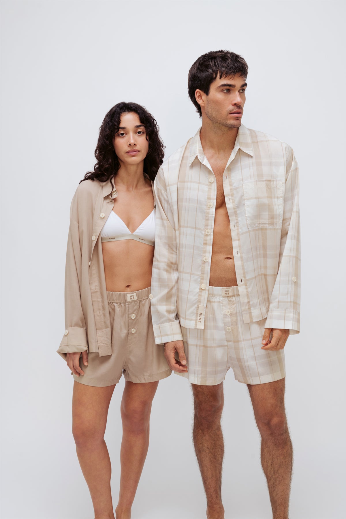 Oat boxer shorts and sleep shirt worn by female model and oat check boxer shorts and sleep shirt worn by male model