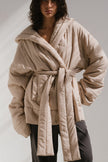 Short Doona Robe Oat worn by female model over Charcoal Cosy Pant, front view showing removable waist tie of robe