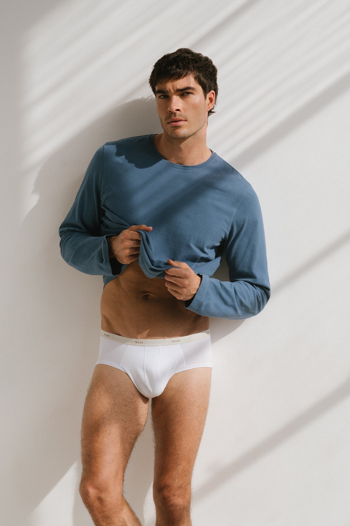 Cosy Long Sleeve Top in Noon worn over Men's Original Brief in white by male model front view