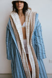 Long Doona Robes in Daybreak Stripe, Oat and Oat Check worn layered over white women's boxer briefs and triangle bralette by female model also wearing Oat Check Doona Hat.