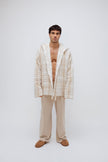 Oat Check Short Doona Robe and Cosy Pant in Oat worn by male model standing front view 