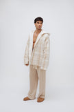 Oat Check Short Doona Robe and Cosy Pant in Oat worn by male model standing front side view 