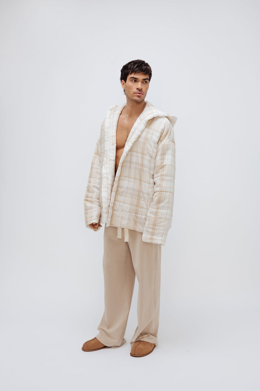 Oat Check Short Doona Robe and Cosy Pant in Oat worn by male model standing front side view 