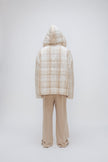 Oat Check Short Doona Robe and Cosy Pant in Oat worn by male model standing back view with hood up over his head