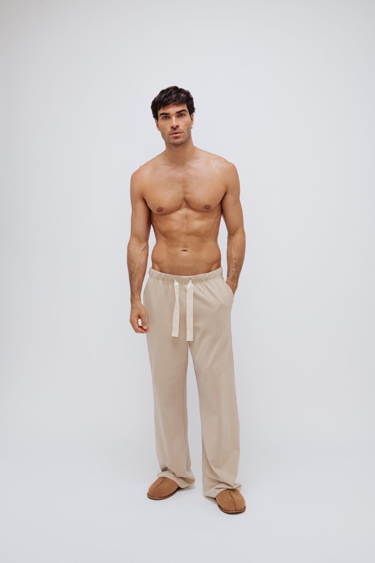 The Cosy Pant in Latte worn by male model front view