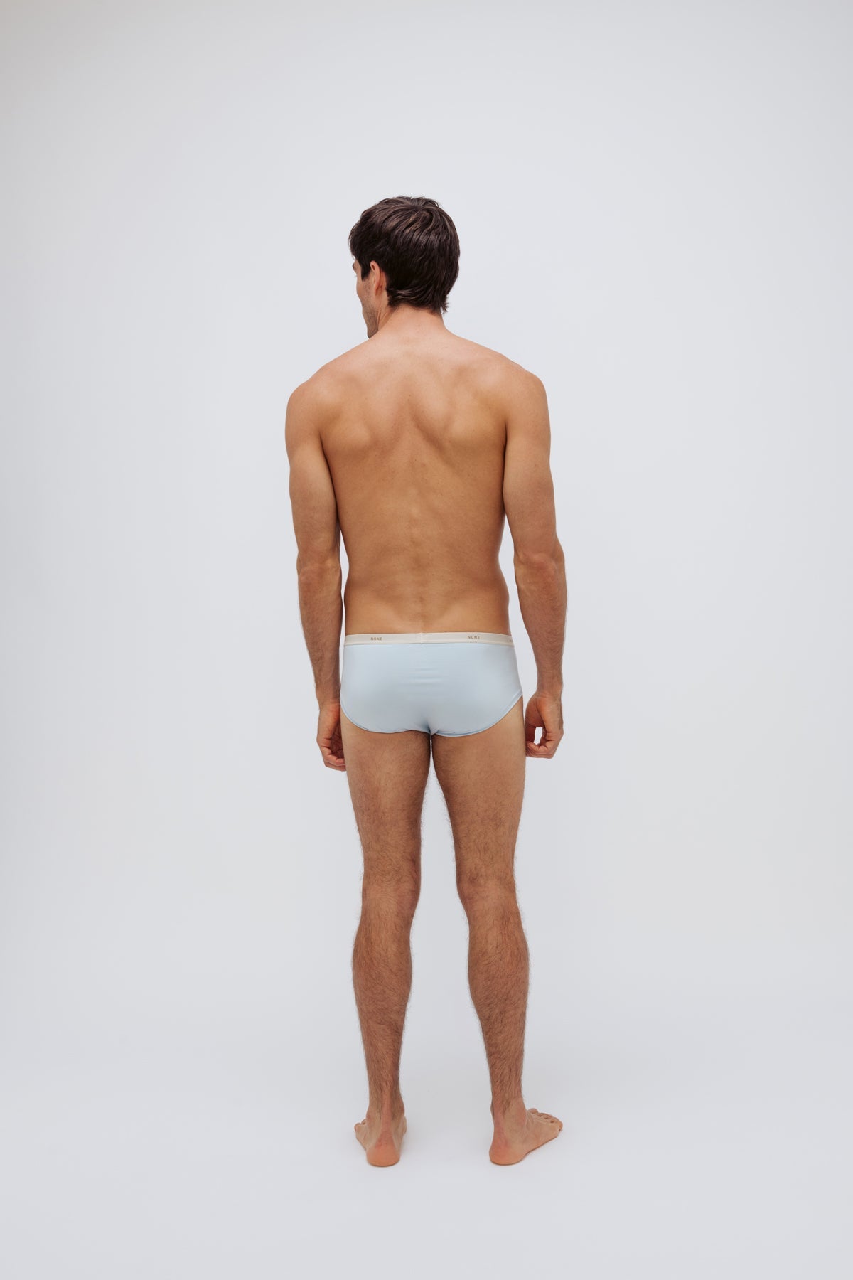 Daybreak men's original briefs worn by male model full back view
