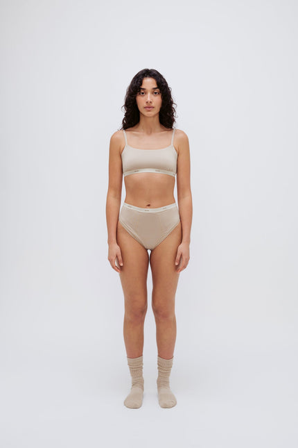 Square Neck Bralette in latte silky-soft micromodal blend worn with women's latte high waisted briefs by female model, front view