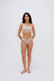 Square Neck Bralette in latte silky-soft micromodal blend worn with women's latte g string by female model, front view showing softly structured silhouette and NUNE soft elastic on bralette.