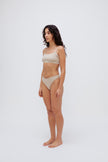Square Neck Bralette in latte silky-soft micromodal blend worn with women's latte g string by female model, front view showing softly structured silhouette and NUNE soft elastic on bralette.
