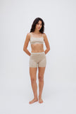 Women’s Boxer Brief in Latte silky-soft micromodal blend, like his Boxer Briefs, only cooler, and Square Neck Bralette in Latte worn by female model, front view