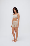 Women’s Boxer Brief in Latte silky-soft micromodal blend, like his Boxer Briefs, only cooler, and Square Neck Bralette in Latte worn by female model, front view