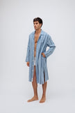 Blue Daybreak Stripe Long House Shirt in Brushed Cotton Flannel worn by male model over men's original briefs in white, standing with one hand on hip