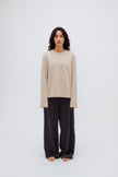 Cosy Long Sleeve Top in Latte and Cosy Pants in Charcoal worn by female model front view showing long sleeve length