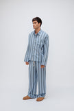 Blue Daybreak Stripe Long Sleeve Sleep Shirt and Pants in Macel worn by male model - facing off to the side