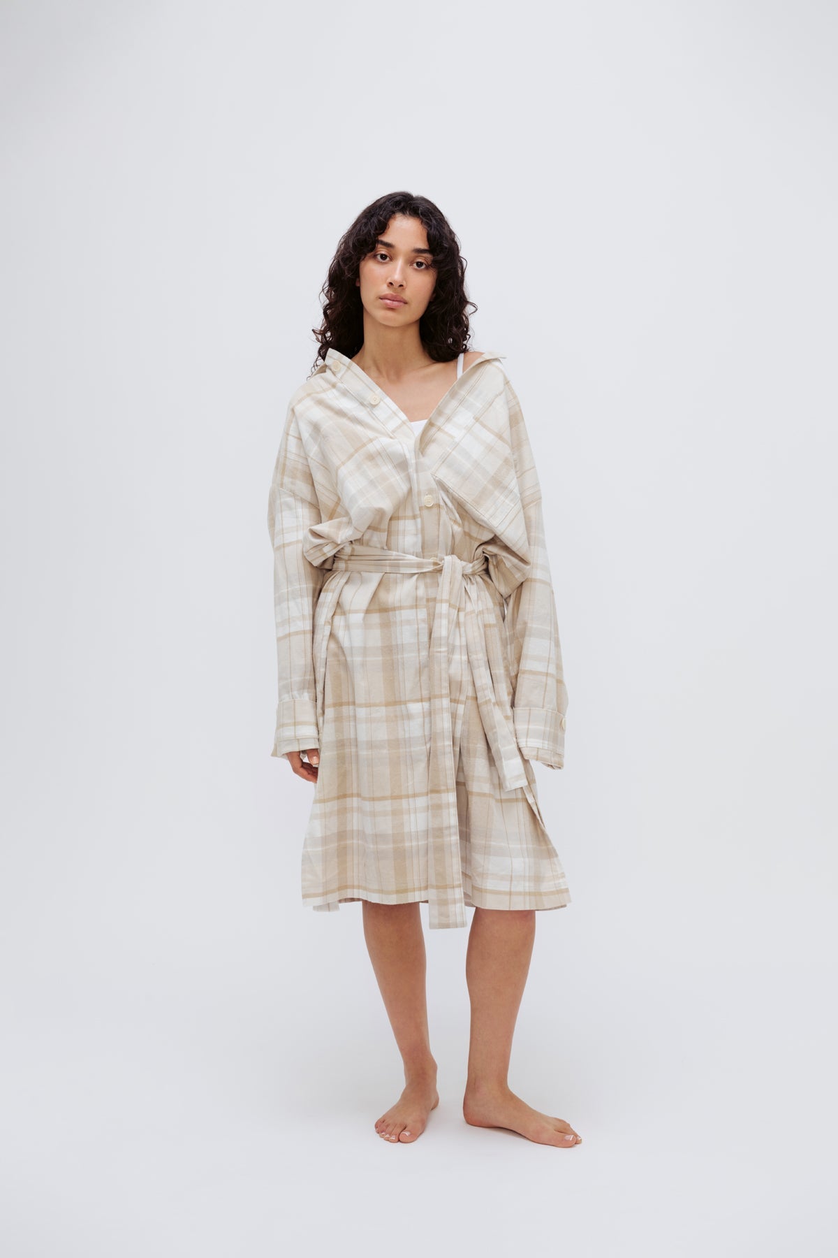 Oat Check House Shirt worn by female model with removable waist tie, standing front view