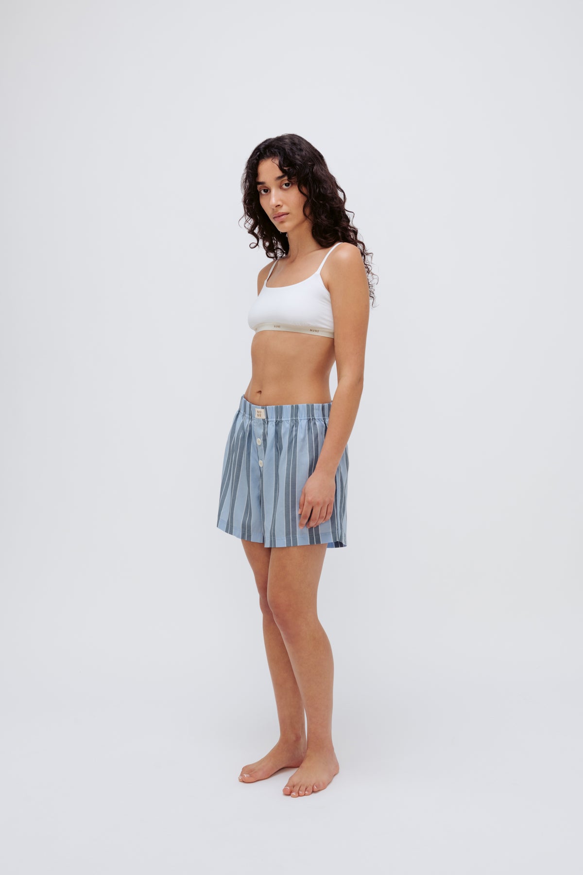 Boxer Short in Daybreak Stripe and Square Neck Bralette in White worn by female model full length front side view