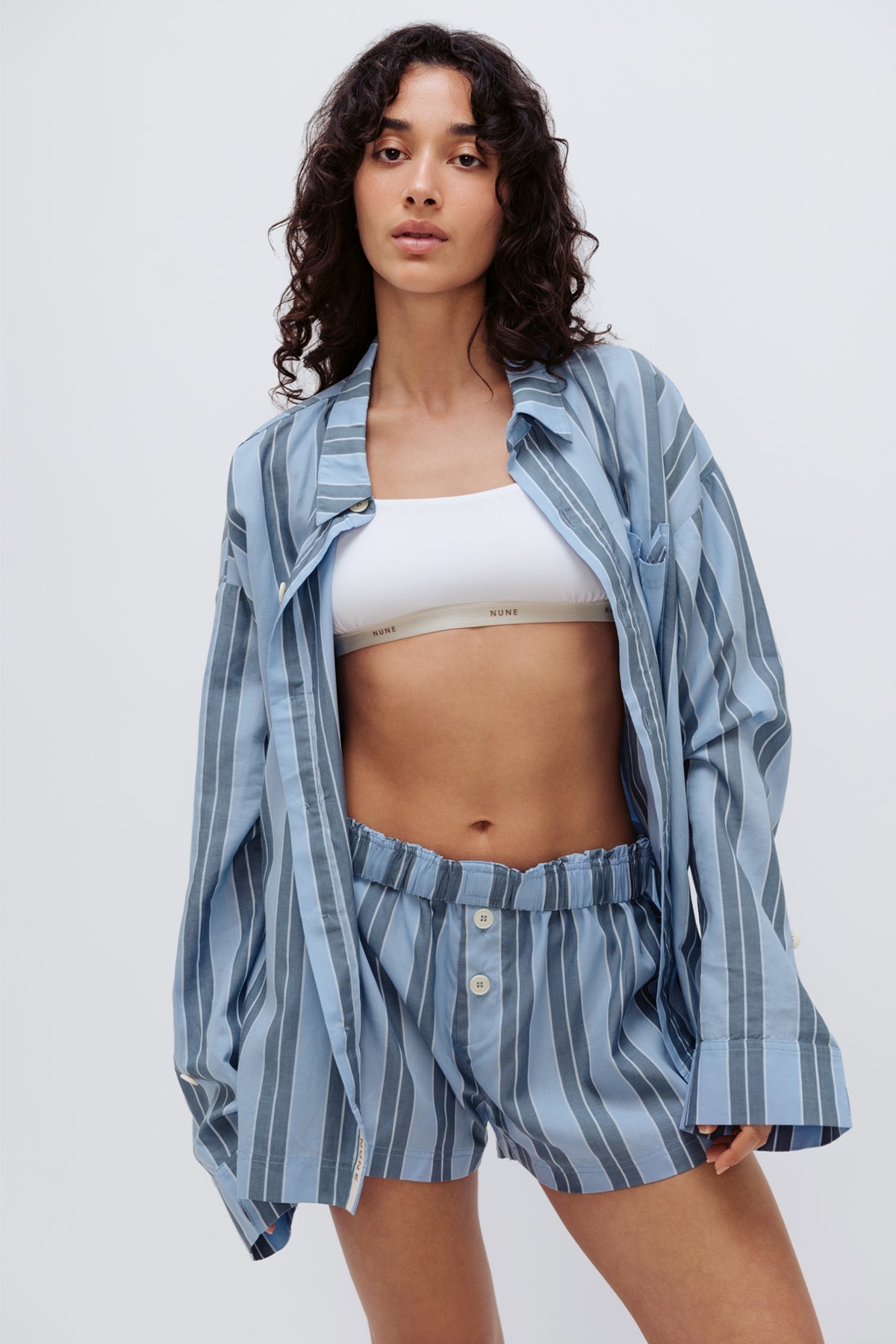 Long Sleeve Sleep Shirt and Boxer Short in Daybreak Stripe worn over Square Neck Bralette in White by female model front view
