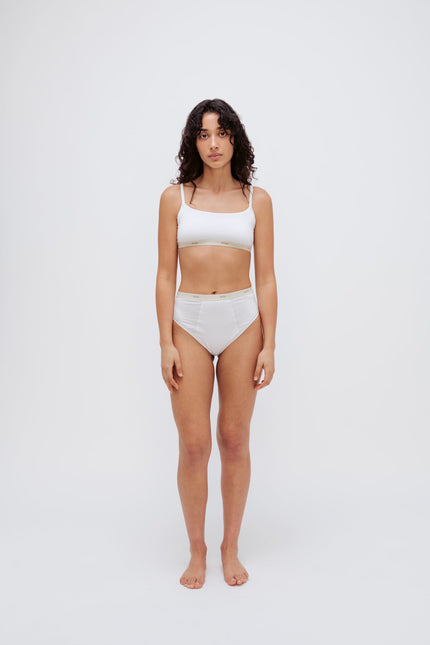 Square Neck Bralette in white silky-soft micromodal blend worn with women's white high waisted briefs by female model, front view