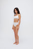 Square Neck Bralette in white silky-soft micromodal blend worn with women's white high waisted briefs by female model, front view