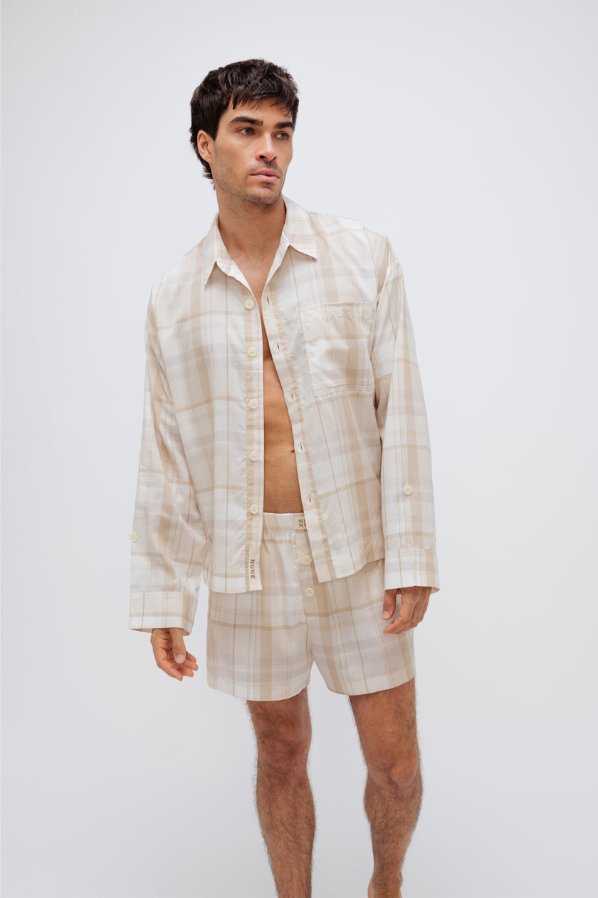 Oat check boxer shorts and sleep shirt worn by male model