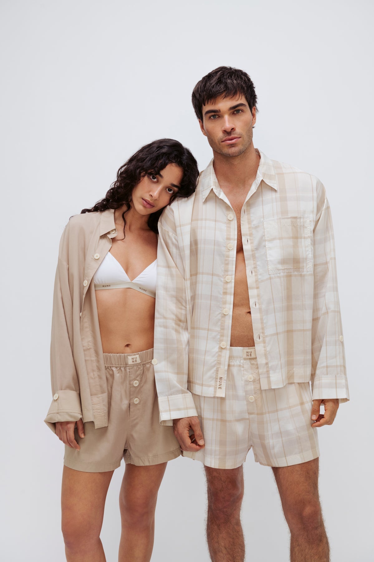 Oat boxer shorts and sleep shirt worn by female model and oat check boxer shorts and sleep shirt worn by male model both facing front