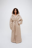 Long Doona Robe Oat worn by female model, front view showing removable waist tie, front pockets and super long length.