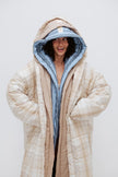 Long Doona Robes in Daybreak Stripe, Oat and Oat Check worn layered by female model smiling with all 3 robe hoods over her head