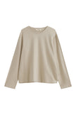 The Cosy Long Sleeve Top in latte front view showing a soft collar band for subtle structure.