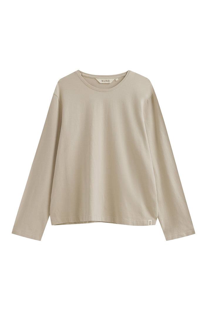 The Cosy Long Sleeve Top in latte front view showing a soft collar band for subtle structure.