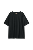 Black Oversized Tee with a drop-shoulder silhouette made in organic cotton jersey, front view