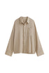 Lightweight and breathable, this oat long sleeve sleep shirt offers year-round comfort. Shirt front view.