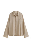 Lightweight and breathable, this oat long sleeve sleep shirt offers year-round comfort. Shirt front view.