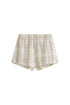 Oat check boxer shorts with 2 front buttons, front view