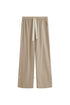 Oat Long Sleep Pant Macel with natural waist tie and adjustable length, front view showing front pockets