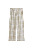 The flannel sleep pant in Oat Check. Adjustable length, a natural waist tie, and functional pockets make it a practical sleepwear essential.  Back view showing single back pocket.