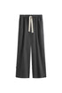 The flannel sleep pant in Evening Pinstripe. Front view showing natural cotton waist tie and front pockets.