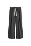 The flannel sleep pant in Evening Pinstripe. Front view showing natural cotton waist tie and front pockets.