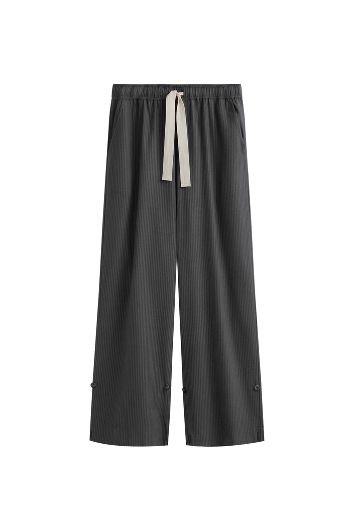 The flannel sleep pant in Evening Pinstripe. Front view showing natural cotton waist tie and front pockets.